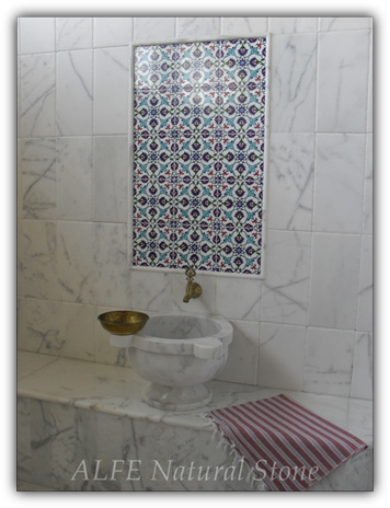 Bathrooms with white marble tiles